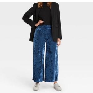 A. New Day velour pants. Size M. NWT